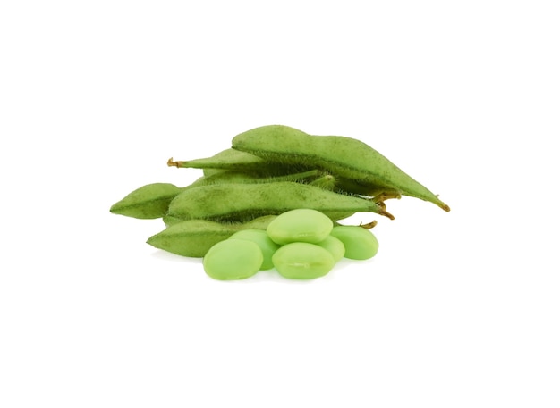 Green soybeans on white surface