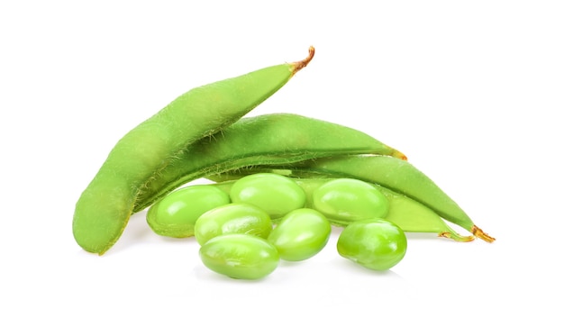 Green soybeans on white surface