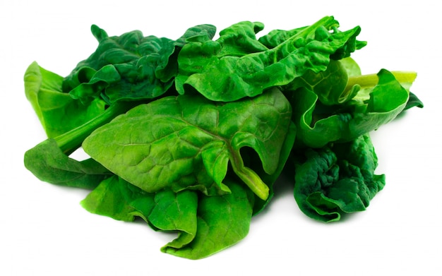 Photo green spinach leaves on isolated white background