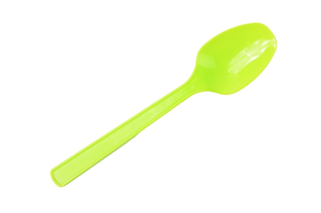 Green spoon isolated on a white background