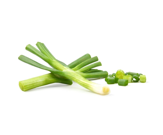 Green spring onions isolated on white surface