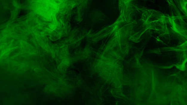 Photo green steam on a black background copy space