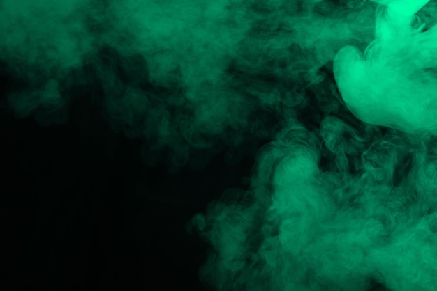 Green steam on a black background