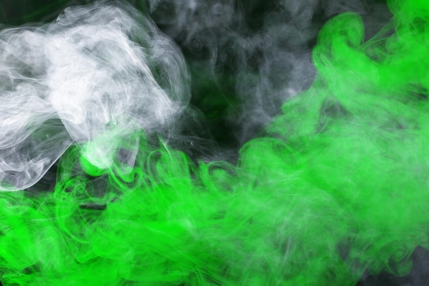 Green steam on a black background