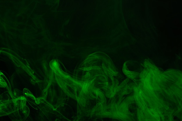 Photo green steam on a black background.