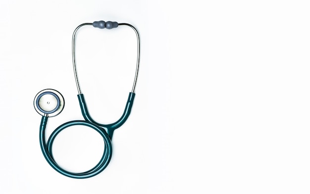 Green stethoscope with copy space. Medical tool for doctor
