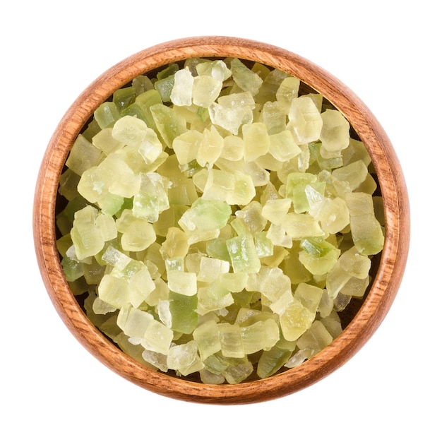 Green succade in a bowl over white