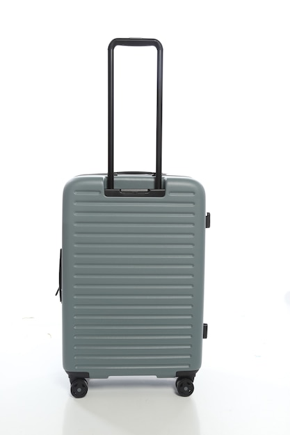 Green 
suitcase on white background