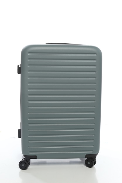 Green 
suitcase on white background