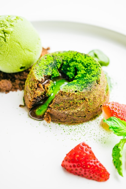 Green tea chocolate lava with ice cream and strawberry