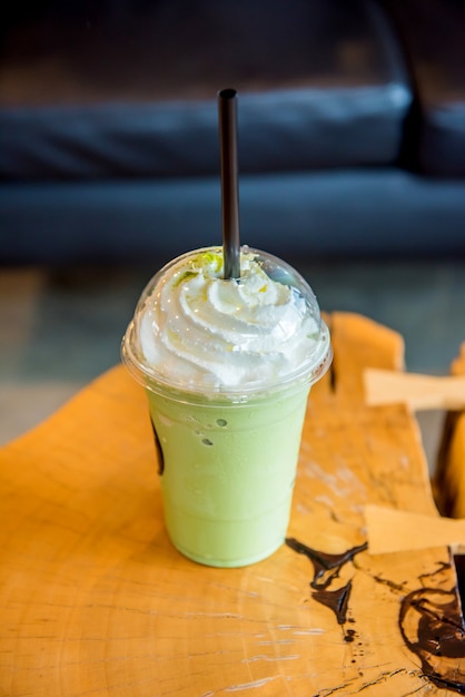 green tea frappe and blended. sweet and cold water