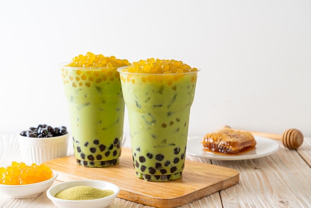 green tea latte with bubble and honey bubbles