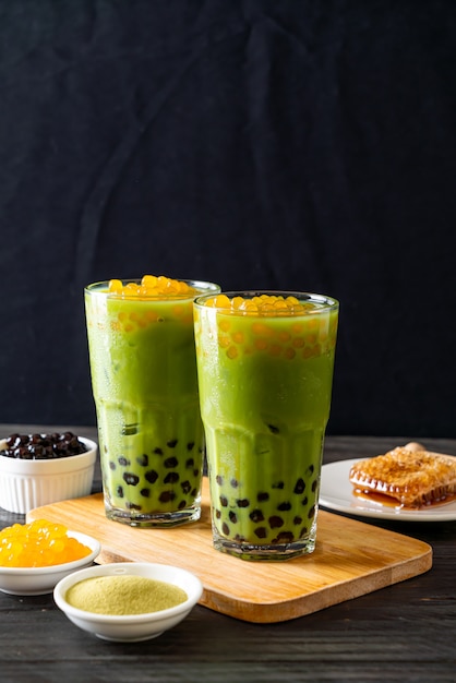 green tea latte with bubble and honey bubbles