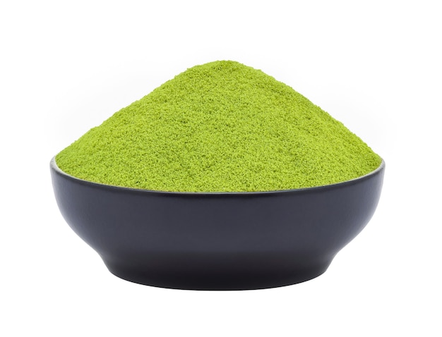 Green tea powder in a bowl on white background(stacked focus image)