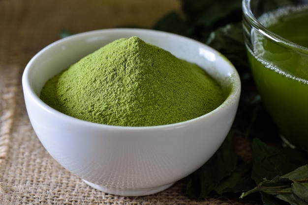 Green tea powder in cup