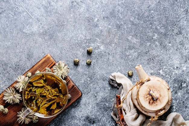 Green tea with ceramic teapot