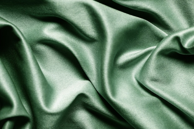 green textile abstract background. Close up