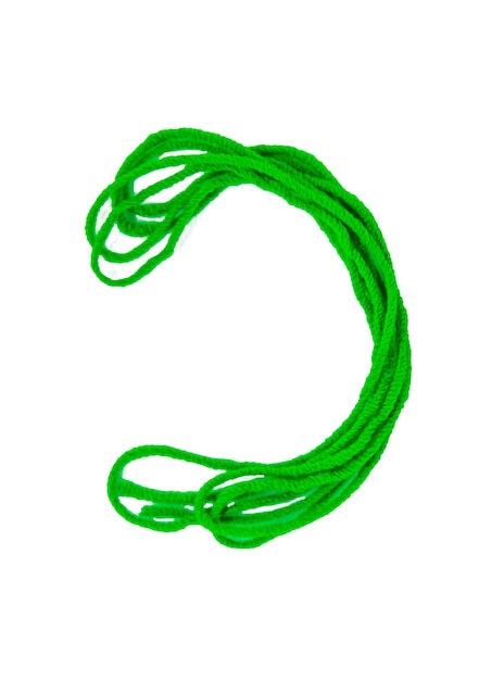 白い背景の選択と集中に緑の糸を分離します。