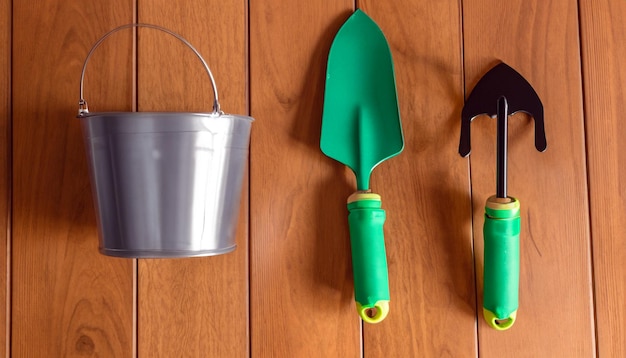 Green Thumb Essentials Top View of Gardening Tools on the Wooden Floor Get Ready to Cultivate