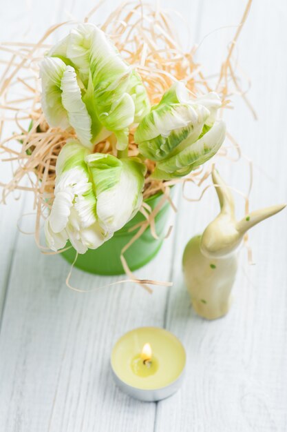 Green tulips and decorative bunny