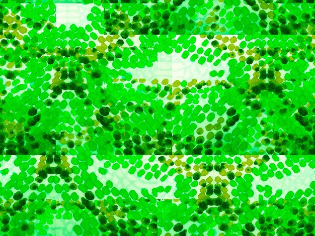 Photo green and turquoise geo symmetric ikat rapport. watercolor ethnic design. summer rhombus background. snake skin random texture. vibrant geometric swimwear pattern. ethnic seamless pattern.