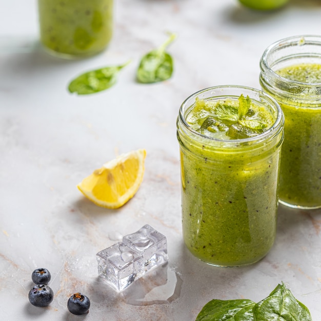 Green vegetable juice with spinach and fruits