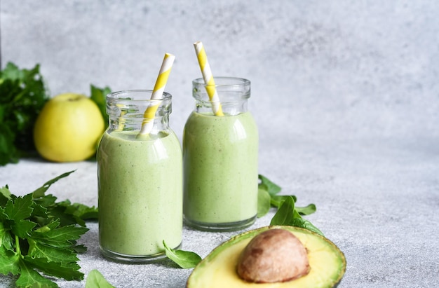 Premium Photo | Green vegetable smoothie with parsley celery and avocado