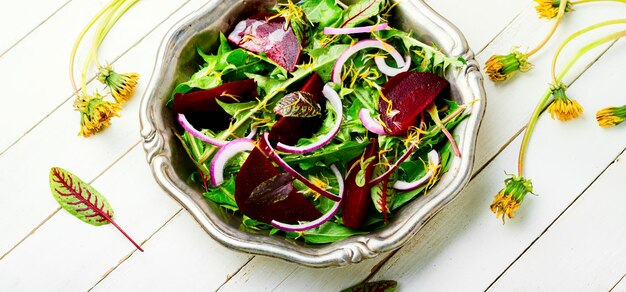 Green vegetarian salad made from beets and greens.Vegan menu.