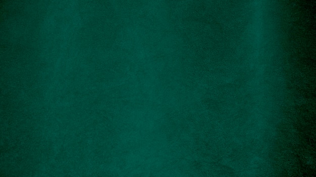 Green velvet fabric texture used as background Empty green fabric background of soft and smooth textile material There is space for text