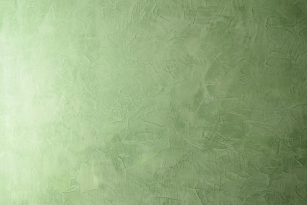 Текстура зеленой венецианской штукатурки Фон венецианской штукатурки Текстура стены