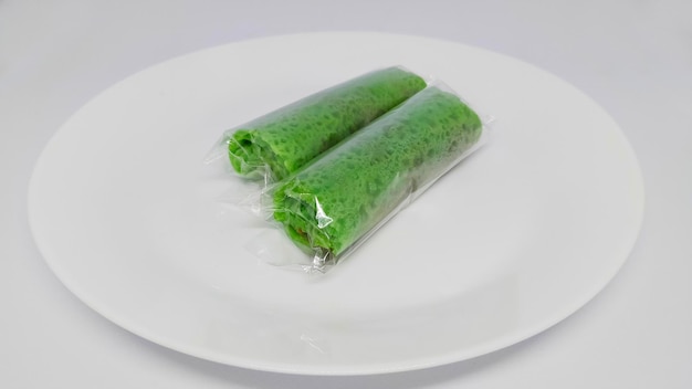 Green wGreen wrap roll quotDadar Gulungquot cake traditionele gerechten uit Azië Indonesiërap roll quotDadar Gulungquot cake traditionele gerechten uit Azië Indonesië