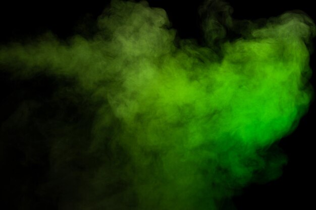 Green and white steam on a black background