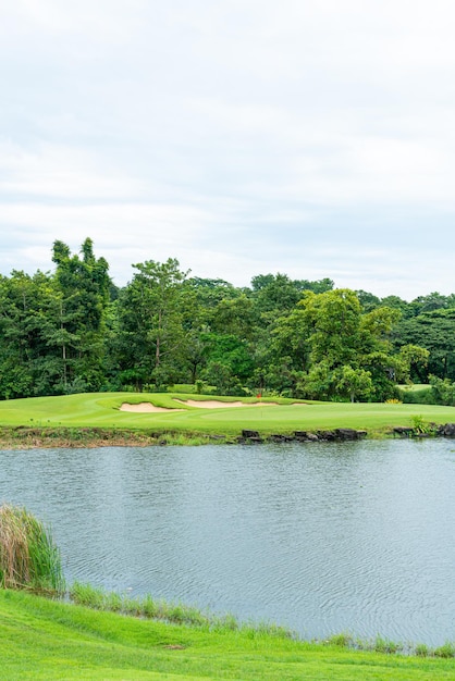 Green with sand bunkers on golf course