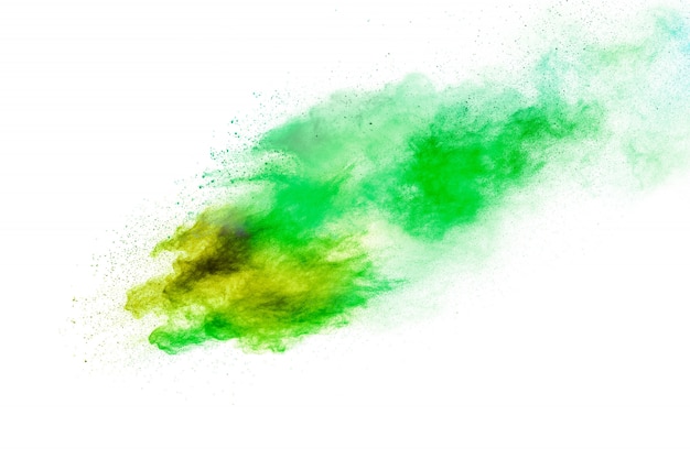 Green yellow dust splash. Green yellow color powder explosion cloud on white background. 