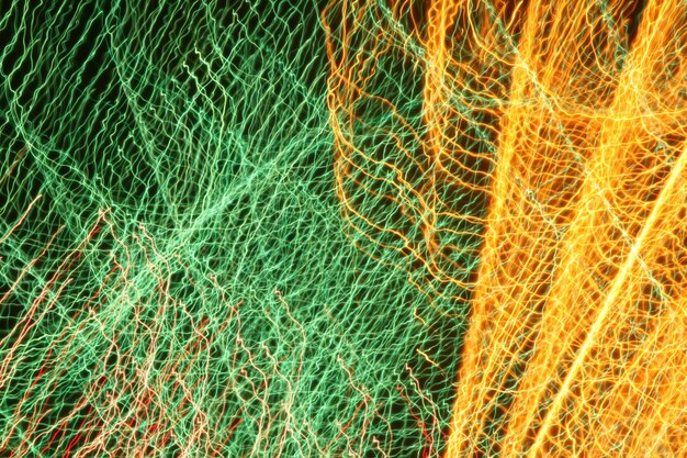 Green and yellow street light nets at night