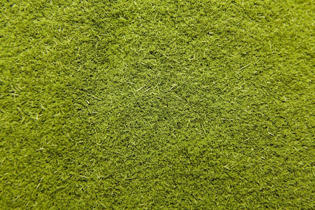 Green young wheatgrass powder texture. Food background.