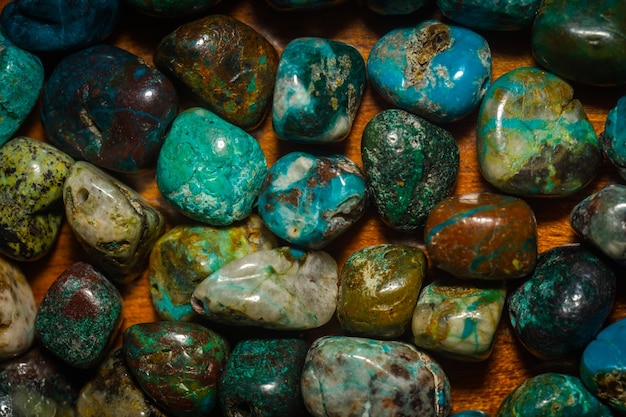 Greenish blue chrysocolla stone beads in irregular shape.
