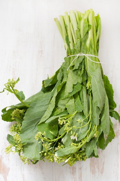 Greens on white wooden table