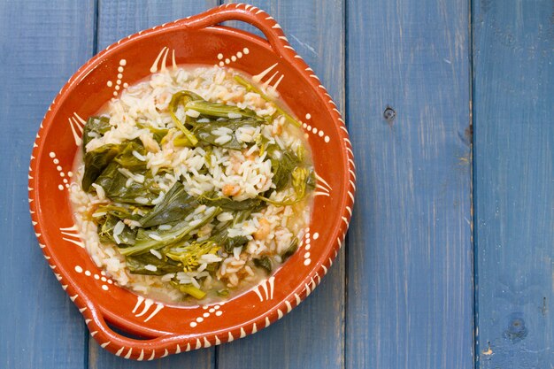 Greens with smoked portuguese sausage and rice