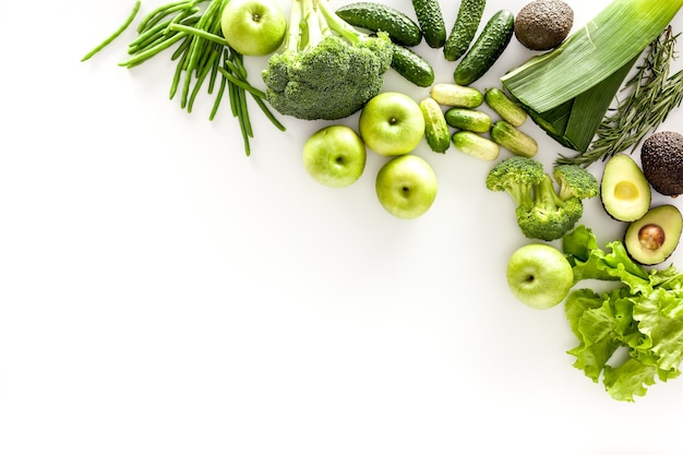 Greeny cocktail ingredients on white