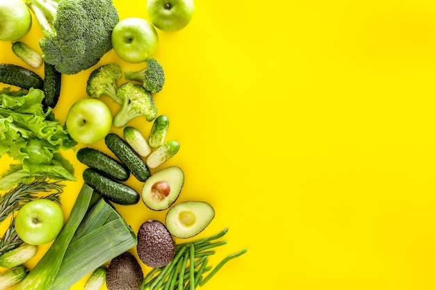 Greeny cocktail ingredients on yellow