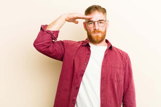 Photo greeting the camera with a military salute in an act of honor and patriotism, showing respect