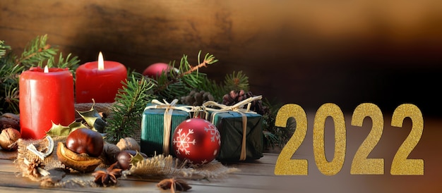 Greeting card 2022 with  christmas decoration on a table