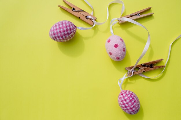 Greeting card and eggs hanging on the clothesline. 