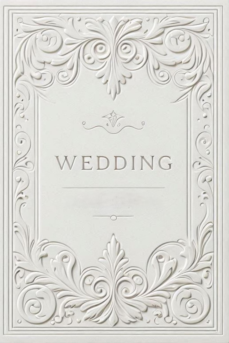 Photo greeting card features an intricate embossed design with floral and scroll patterns