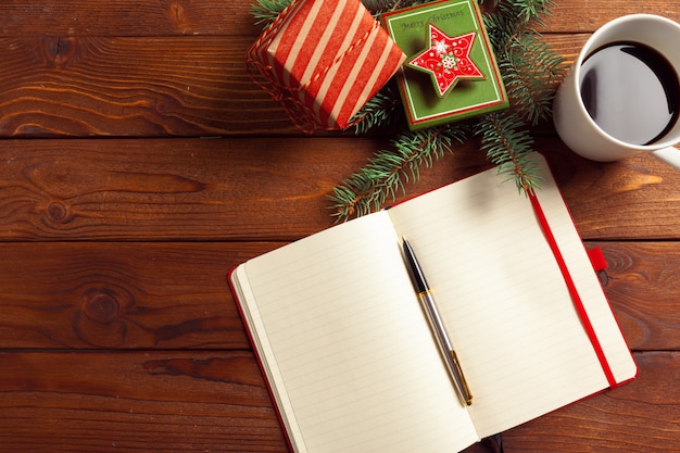 Greeting card and gift box on office table