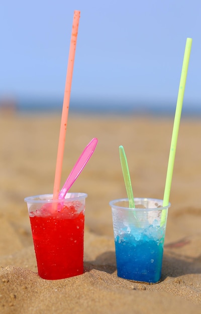 Grenadines with colorful syrup and refreshing ice at the seaside