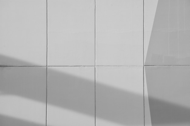 Grey cement wall with line and shadow