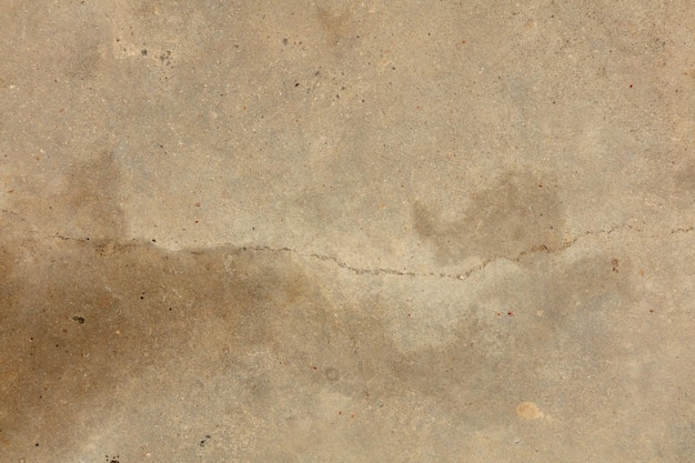 Grey concrete material with a crack