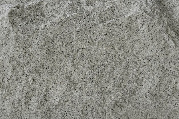 Grey granite rock background texture